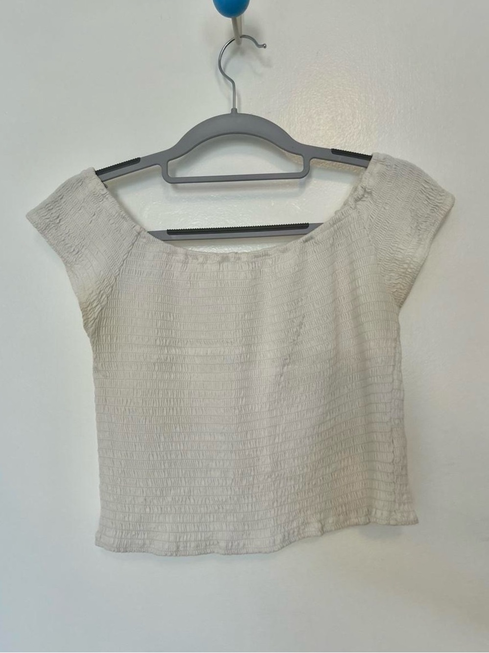 Brandy Melville White Smocked Off-The-Shoulder Crop Top.